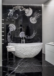 Bathroom design in black and white marble tiles
