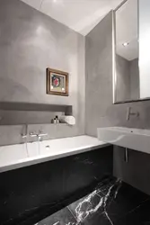 Bathtub With Decorative Plaster And Tiles Photo Design