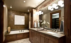 Bathtub with decorative plaster and tiles photo design