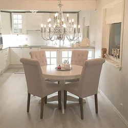 Round table in the interior of the kitchen living room
