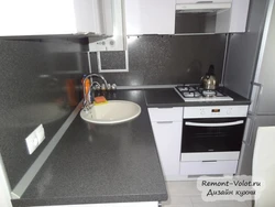 Kitchen in Khrushchev with dishwasher photo