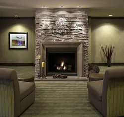 Living rooms with artificial fireplace photo