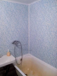 Bathroom design with self-adhesive panels
