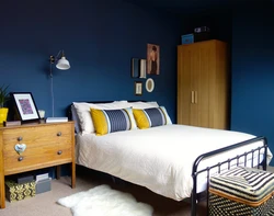 Yellow bed in the bedroom interior