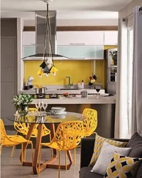 Yellow sofa in the kitchen interior