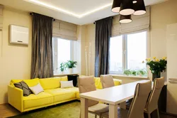 Yellow sofa in the kitchen interior