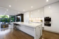 White kitchen design with island