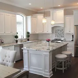 White kitchen design with island