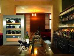 Wine cabinet in the kitchen interior photo