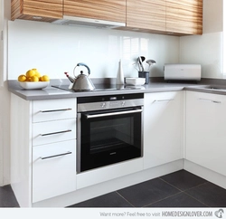 White kitchen black oven photo