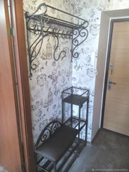 Shoe Rack In The Hallway Made Of Metal Photo