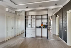 Built-in wardrobes in the bedroom up to the ceiling photo