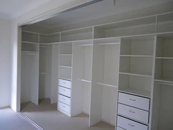 Built-In Wardrobes In The Bedroom Up To The Ceiling Photo