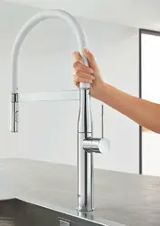 Kitchen faucet with flexible hose photo