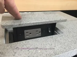 Built-In Sockets For The Kitchen In The Countertop Photo