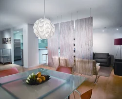 Living room zoning with curtains photo