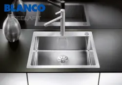 Kitchen with metal sink photo
