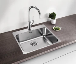 Kitchen with metal sink photo