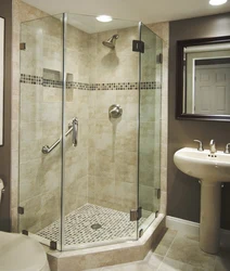 Photo of shower enclosures in the bathroom with a tray