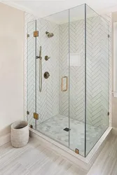 Photo of shower enclosures in the bathroom with a tray