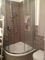 Photo Of Shower Enclosures In The Bathroom With A Tray