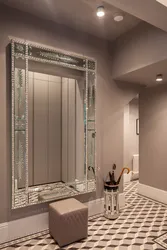 Mirror with lighting in the hallway wall-mounted interior