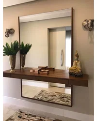 Mirror with lighting in the hallway wall-mounted interior