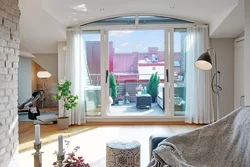 Apartment design with a full-wall window