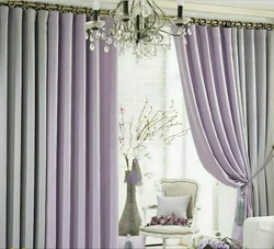 Pink curtains in a gray living room interior