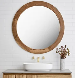 Mirror in a frame for the bathroom photo