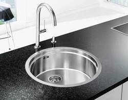 Kitchen design with round sinks