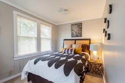 Bedroom interior with one window and door