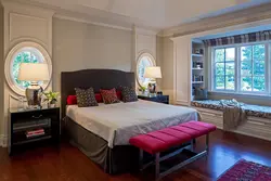 Large bedroom interior with one window