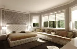 Large bedroom interior with one window