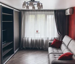 Interior of a studio apartment curtains