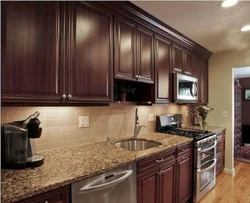 Light kitchen with dark furniture photo