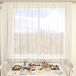 Beige tulle in the kitchen interior