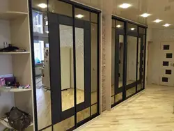 Wardrobe Doors With Mirror In The Hallway Photo