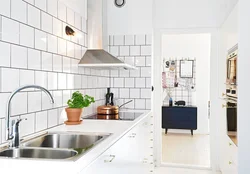 Apron for a gray kitchen made of tiles design photo