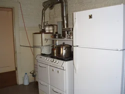 Design of a small kitchen with a floor-standing gas boiler photo