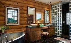 Bath in a wooden house with a window photo
