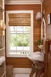 Bath in a wooden house with a window photo