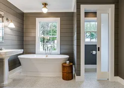 Window in the bathroom in a wooden house photo