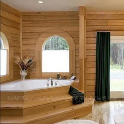 Window in the bathroom in a wooden house photo