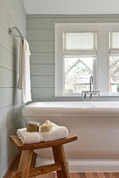 Window in the bathroom in a wooden house photo