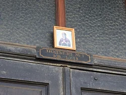 Icon above the door to the apartment photo