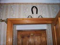 Icon above the door to the apartment photo
