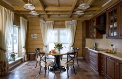 Living room kitchen design in a log house