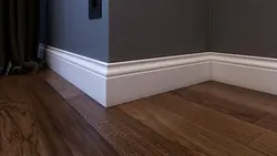 Floor skirting boards in the living room interior