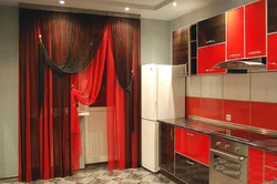 Curtains with flowers in the kitchen interior
